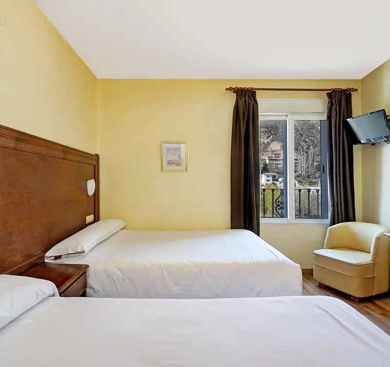 -> Book your triple room at Hotel Labella Granada · Between Granada, Sierra Nevada and the Costa Tropical
