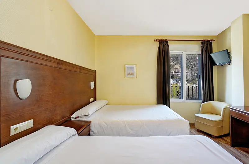 Book your room at Hotel Labella Granada · Between Granada, Sierra Nevada and the Costa Tropical